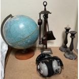 A globe together with a fireside tidy, electroplated candlesticks,