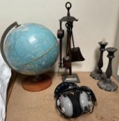 A globe together with a fireside tidy, electroplated candlesticks,