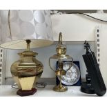 A brass table lamp together with a brass hanging lamp,