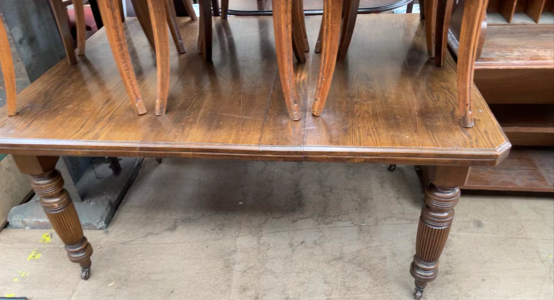 An early 20th century extending dining table on reeded legs together with a set of six continental - Image 2 of 3