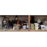 A collection of breweriana including water jugs, stoneware flasks, Bells decanters,