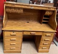 A Victorian style serpentine tambour fronted desk, by Country Desk,