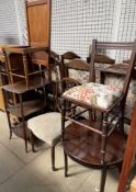 An Edwardian shield back chair together with two other chairs an occasional table and a three tier
