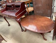 A reproduction mahogany desk,