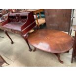 A reproduction mahogany desk,