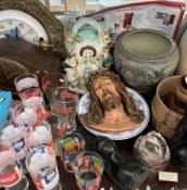 Carved African figure heads together with pottery vases, Jesus Christ plaster head, clocks, books,