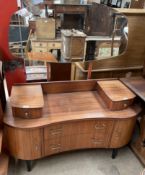 A mid 20th century teak dressing table,