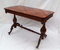 A Victorian rosewood and geometric panelled side table of rectangular form with rounded corners on