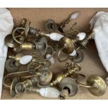 A collection of brass wall lights