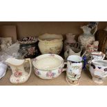Assorted decorative jugs, together with vases,