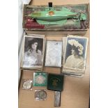 A Sutcliffe model of Nautilus, boxed together with a cigarette case, assorted postcards,