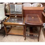 An Edwardian occasional table with a central fan inlay together with a toilet mirror and a modern