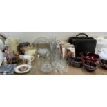 A black leather doctors bag, together with ruby glass bowls, 45's, glasswares,