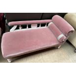 An Edwardian white painted chaise longue