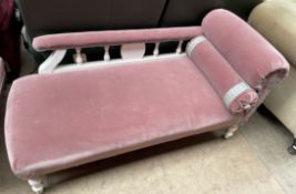 An Edwardian white painted chaise longue