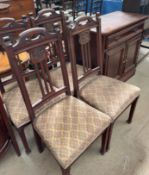 A set of four Edwardian dining chairs together with a modern side cabinet