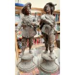 A pair of spelter figures of cavaliers