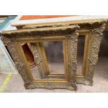 A pair of gilt decorated picture frames