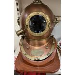 An anchor engineering brass and copper divers helmet,