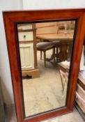 A rectangular mahogany framed wall mirror