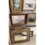 A stamped brass wall mirror together with another wall mirror paintings and prints