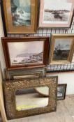 A stamped brass wall mirror together with another wall mirror paintings and prints