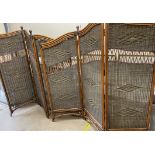 A pair of bamboo and wicker three fold screens