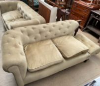 A matched pair of late 19th / early 20th century drop arm chesterfield settees