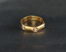 An 18ct yellow gold ring,