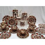 A Royal Crown Derby 1128 Imari pattern part tea set, comprising a hot water pot, teapot, cream jug,