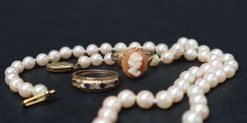 A pearl necklace with sixty one pearls to a 9ct gold clasp,