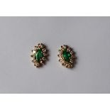 A pair of emerald and diamond earrings,