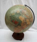 A Philips' Challenge Globe, Scale 1:37,500,000, on a turned wooden stand,