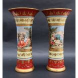A pair of Vienna style flared vases, painted with maidens and cherubs,