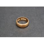 A 22ct yellow gold wedding band, approximately 8.