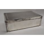 A George V silver cigar box of rectangular form,.