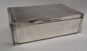 A George V silver cigar box of rectangular form,.