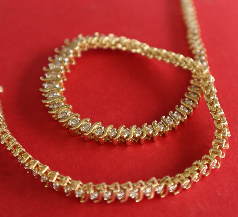 A 14ct yellow gold diamond set necklet set with one hundred and five round brilliant cut diamonds, - Image 4 of 5