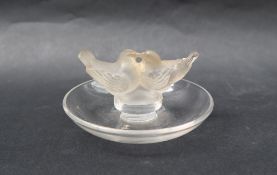 A Lalique pin tray, of circular form, with two lovebirds,