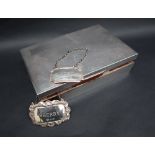 A George VI silver cigarette box of rectangular form, with engine turned decoration, Birmingham,