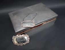 A George VI silver cigarette box of rectangular form, with engine turned decoration, Birmingham,