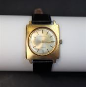 A Gentleman's yellow metal wristwatch, the circular dial with baton markers, inscribed "J.P.