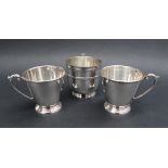 A pair of Elizabeth II silver christening mugs, of tapering form, with a spreading foot, Birmingham,