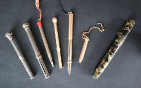 A Mabie & Todd Co cracked ice fountain pen, together with a yellow metal propelling fountain pen,