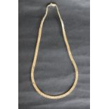 A 14ct yellow gold necklace, with three rows of rectangular links, 42.