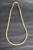 A 14ct yellow gold necklace, with three rows of rectangular links, 42.