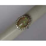 An opal and diamond dress ring,