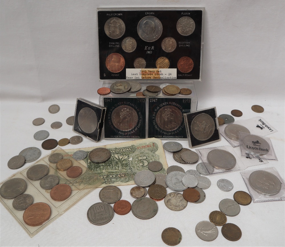 An Elizabeth II 1965 coin set together with a collection of crowns and world coins