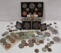 An Elizabeth II 1965 coin set together with a collection of crowns and world coins
