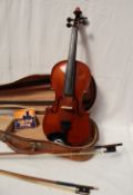 A Violin with two piece back and ebonised stringing, bears a label for John Betts,